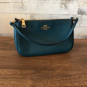 Coach small teal handbag